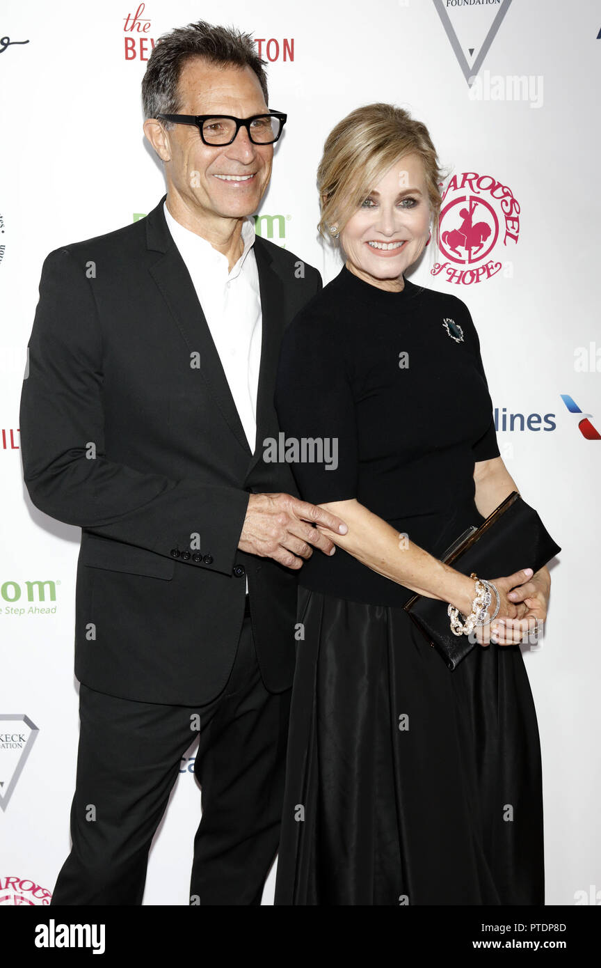 Michael Cummings and his wife Maureen McCormick attending the Carousel