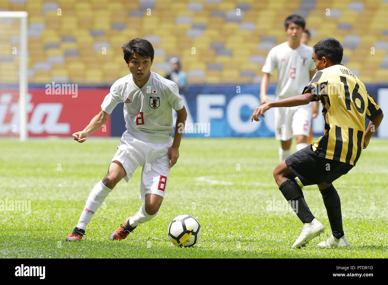 Kuala Lumpur, Malaysia. 27th Sep, 2018. Hikaru Naruoka (JPN), Muhamad Umar  Hakeem Bin Suhar Redzuan (MAS) Football/Soccer : AFC U-16 Championship 2018  Group A match between Malaysia 0-2 Japan at Bukit Jalil