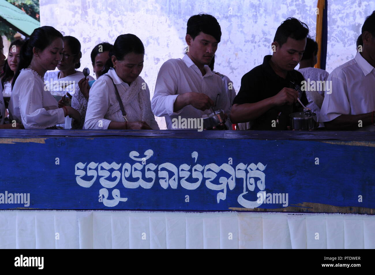 Kandal province, Cambodia. October 9th, 2018. Cambodians donate rice at Wat Prey Veng temple during the Pchum Ben festival, also known as 'Ancestors' Day'. Credit: Kraig Lieb / Alamy Live News Stock Photo