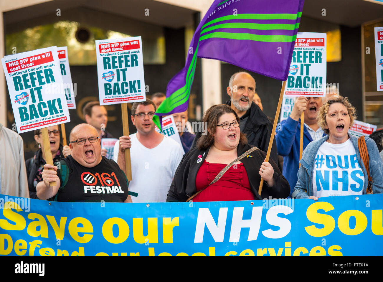 A protest is taking place outside Southend Council Civic Centre offices prior to a People Scrutiny Committee meeting deciding on whether the Council will accept or reject the Mid and South Essex STP (Sustainability & Transformation Partnership), referring it back to the Secretary of State for Health. In particular there are fears that Southend hospital will be downgraded. Refer it Back slogan. Result was to refer it back Stock Photo