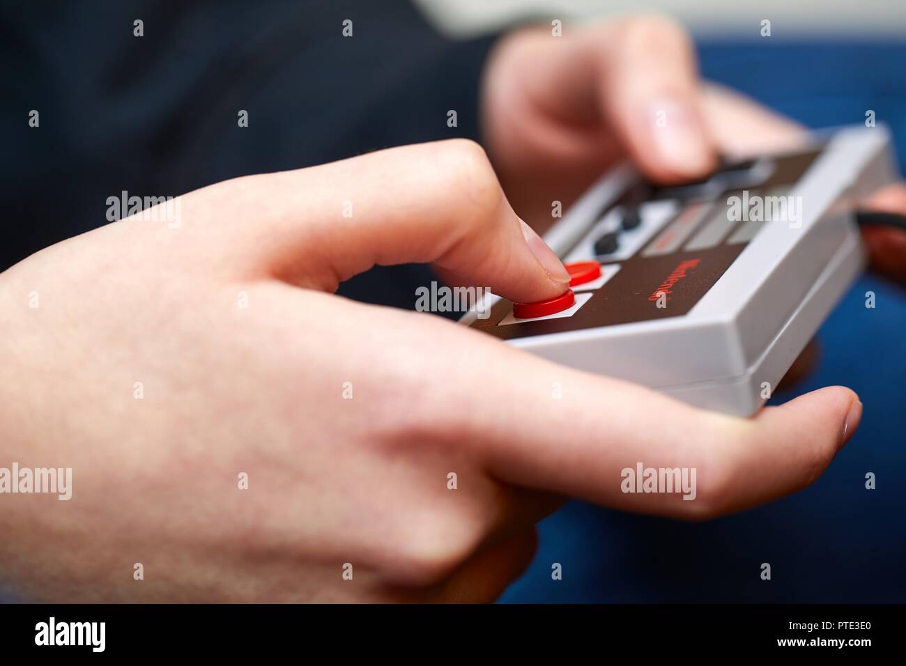 Nintengo NES,playing Super Mario 3 Stock Photo