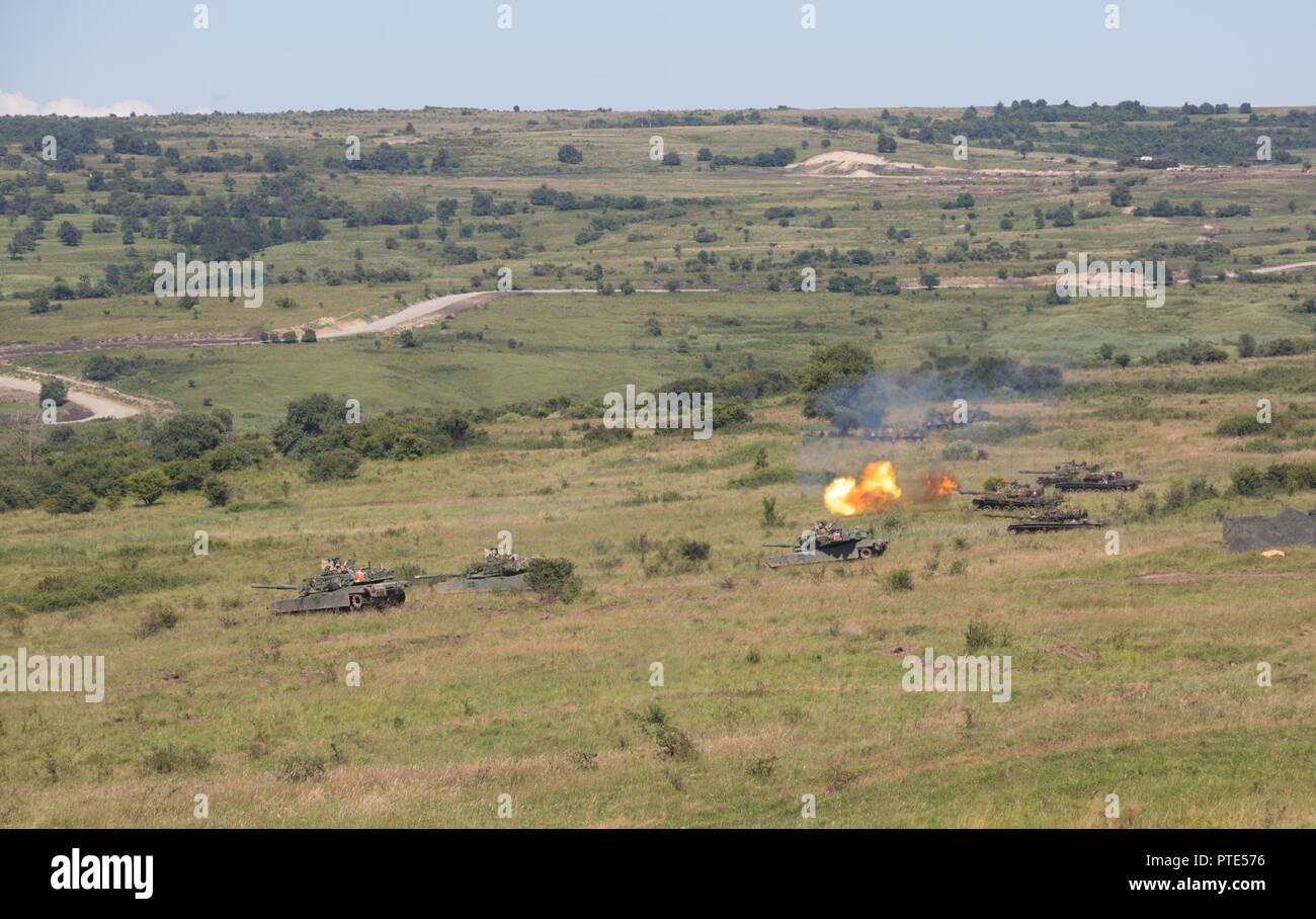U.S. Soldiers assigned to the 1st Battalion, 66th Armor Regiment, 3rd Armored Brigade Combat Team, 4th Infantry Division, fire M2 Bradley Fighting Vehicles during a rehearsal for the combined arms live fire exercise portion of Getica Saber, July 14, 2017 at the Joint National Training Center in Cincu, Romania. Getica Saber 17 is a U.S.-led fire support coordination exercise and combined arms live fire exercise that incorporates six Allied and partner nations with more than 4,000 Soldiers. Getica Saber 17 runs concurrent with Saber Guardian 17, a U.S. European Command, U.S. Army Europe-led, mul Stock Photo