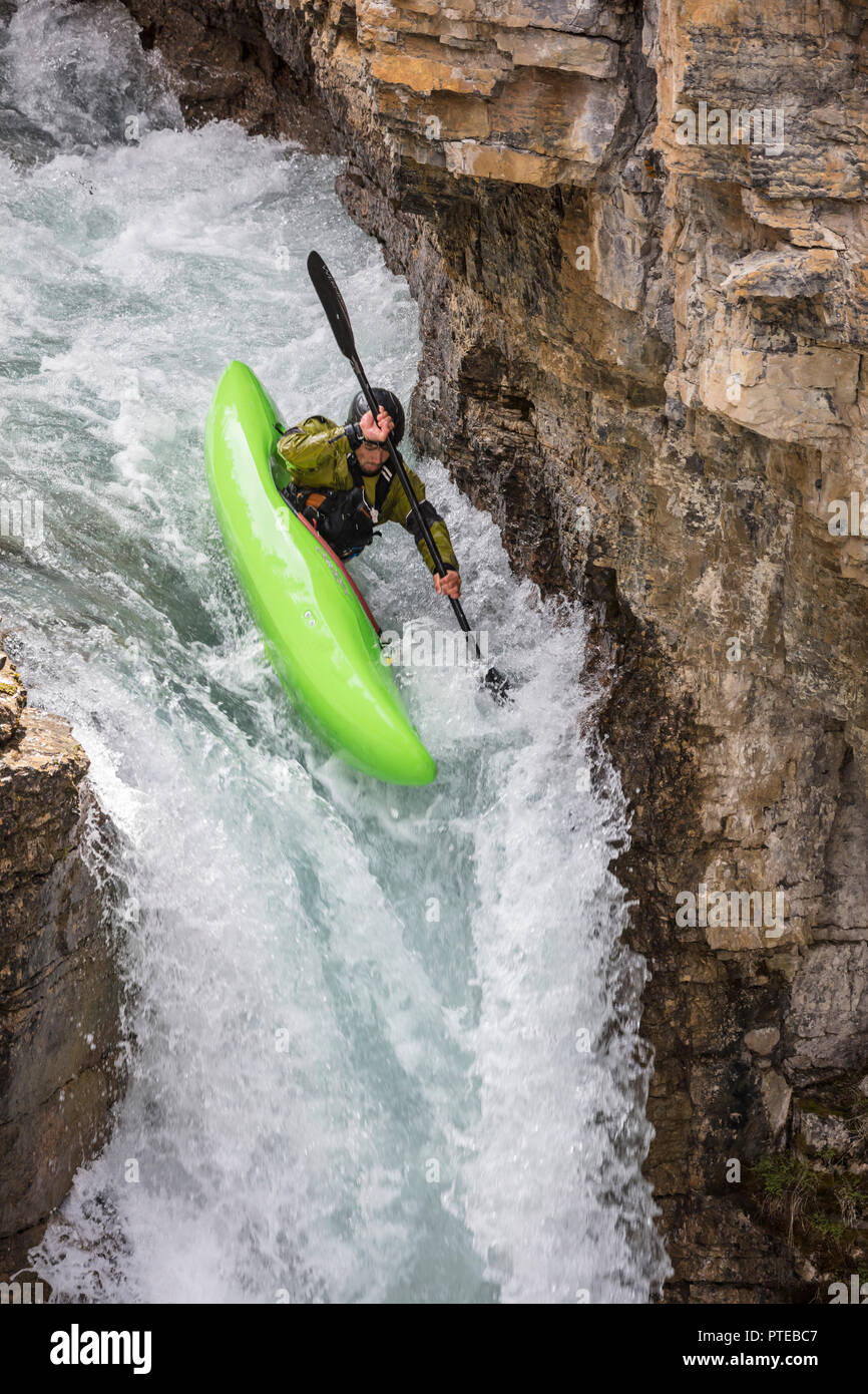 Kayaker descending falls on Beauty Creek in Jasper National Park, Canada. Stock Photo