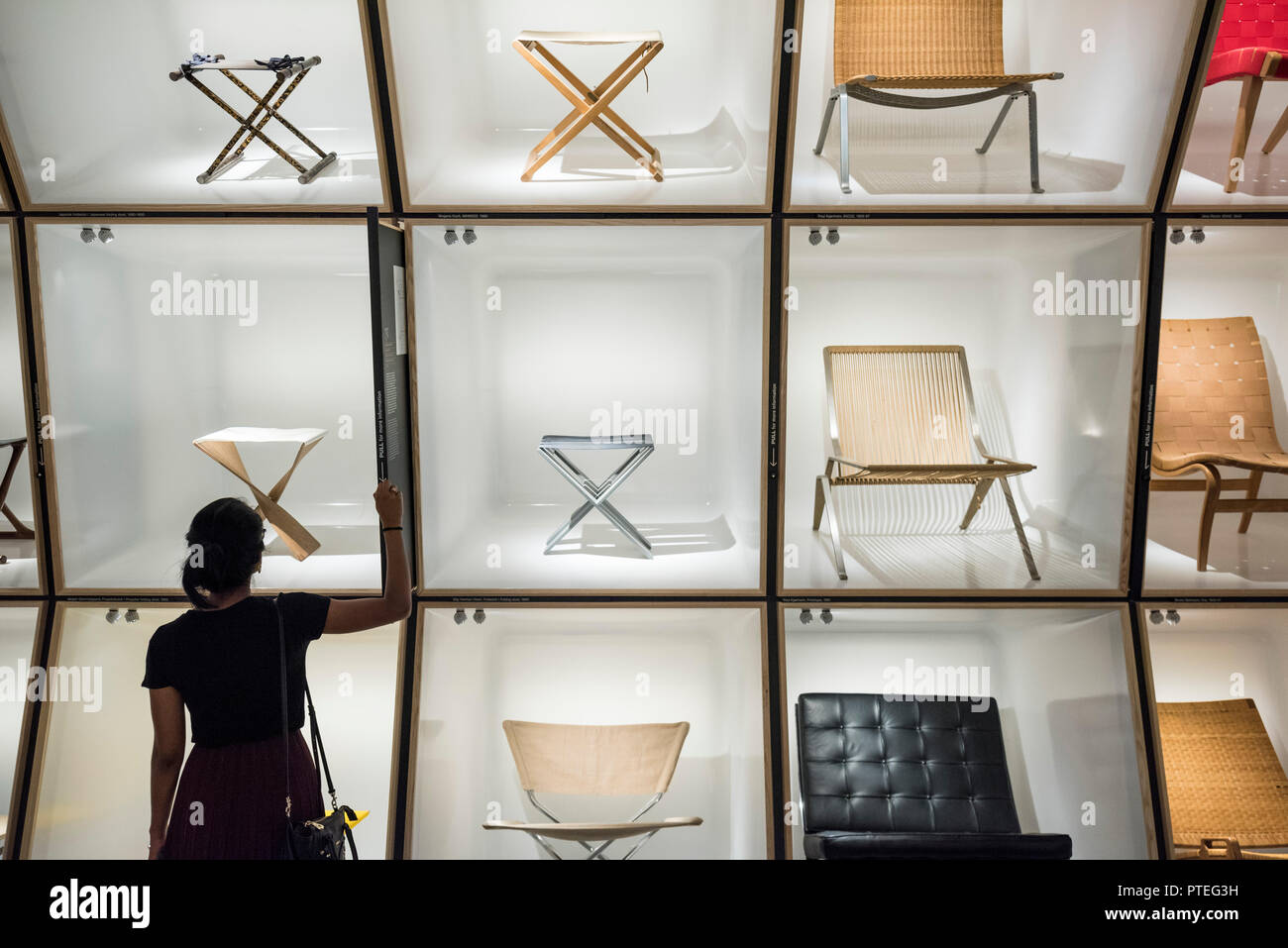Copenhagen. Denmark. Display of iconic Danish chairs at the Danish Museum of Art & Design. Stock Photo