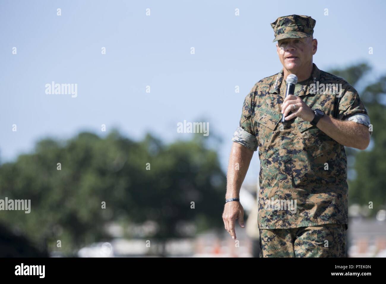 U.S. Marine Corps Gen. Robert B. Neller, commandant of the Marine Corps, speaks to the audience during the II Marine Expeditionary Force (II MEF) change of command ceremony on Camp Lejeune, N.C., July 14, 2017.During the ceremony, Maj. Gen. Walter L. Miller Jr. relinquished his command as commanding general of II MEF to Lt. Gen. Robert F. Hedelund. Stock Photo