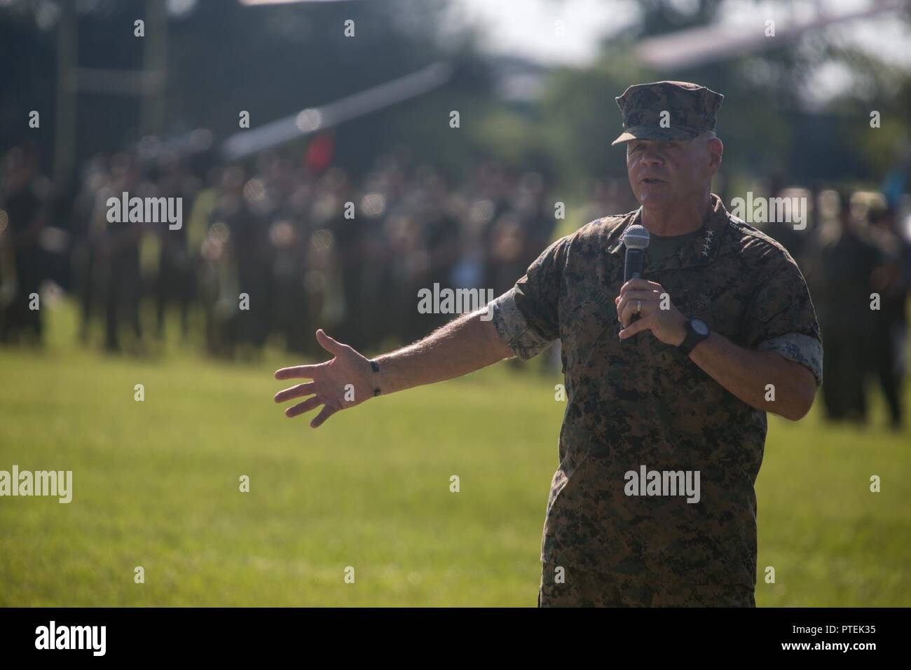 U.S. Marine Corps Gen. Robert B. Neller, Commandant of the Marine Corps, speaks during the II Marine Expeditionary Force (II MEF) change of command ceremony on Camp Lejeune, N.C., July 14, 2017. During the ceremony, Maj Gen. Walter L. Miller, Jr. relinquished his post as commanding general of II MEF to Lt. Gen. Robert F. Hedelund. Stock Photo
