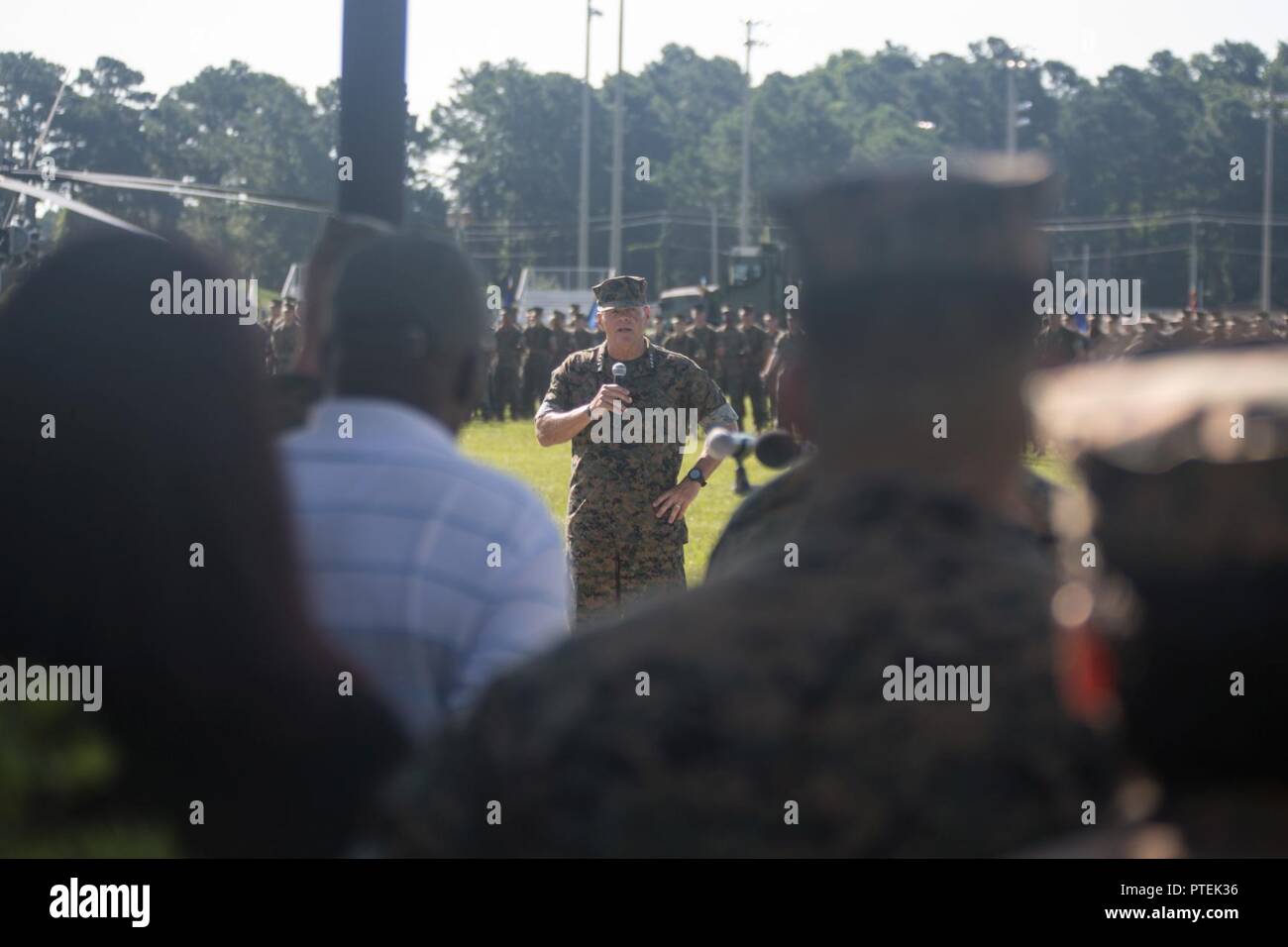 U.S. Marine Corps Gen. Robert B. Neller, Commandant of the Marine Corps, speaks during the II Marine Expeditionary Force (II MEF) change of command ceremony on Camp Lejeune, N.C., July 14, 2017. During the ceremony, Maj Gen. Walter L. Miller, Jr. relinquished his post as commanding general of II MEF to Lt. Gen. Robert F. Hedelund. Stock Photo