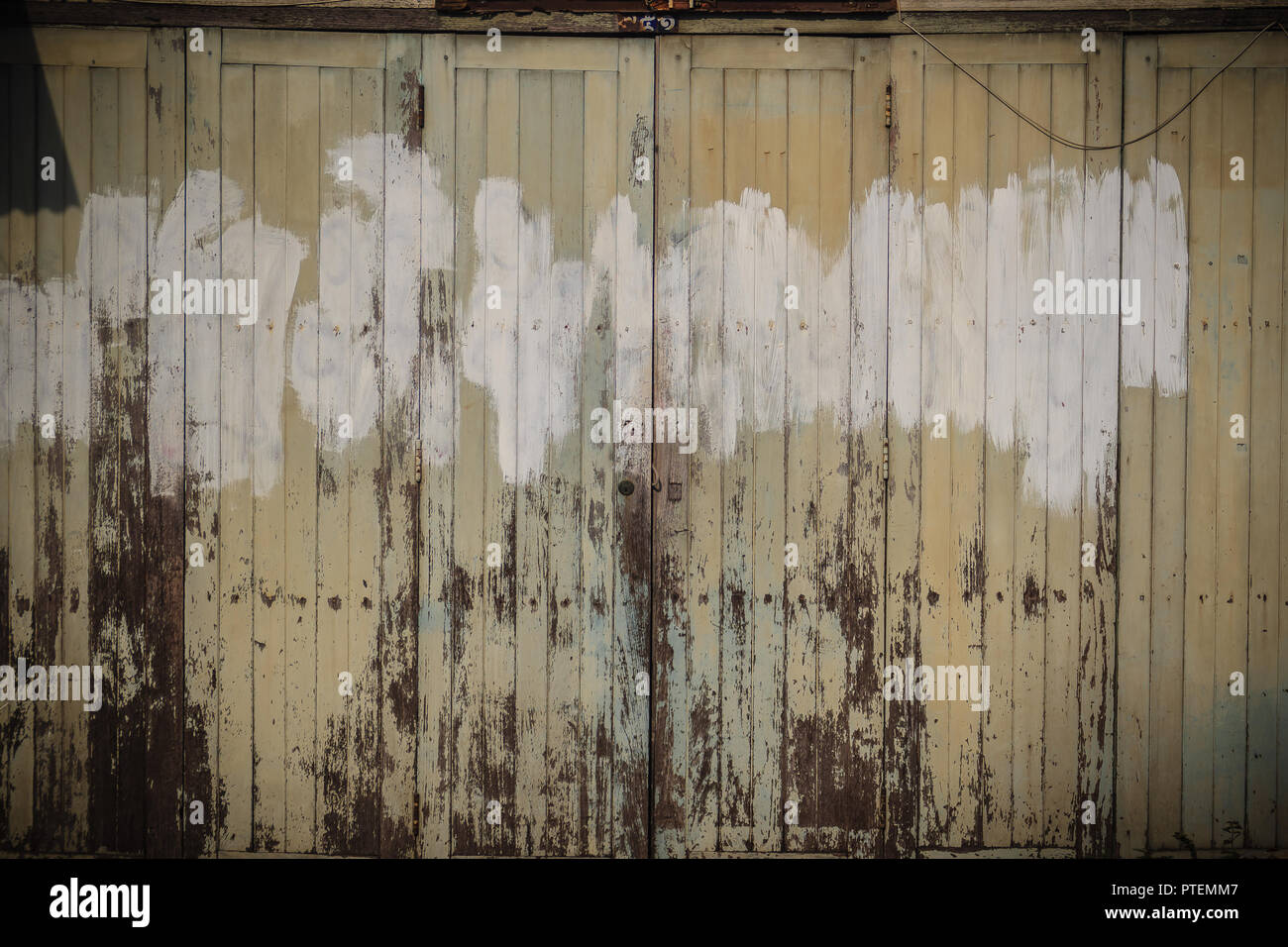 Old ancient wooden swing door background. Vintage of old wooden folding