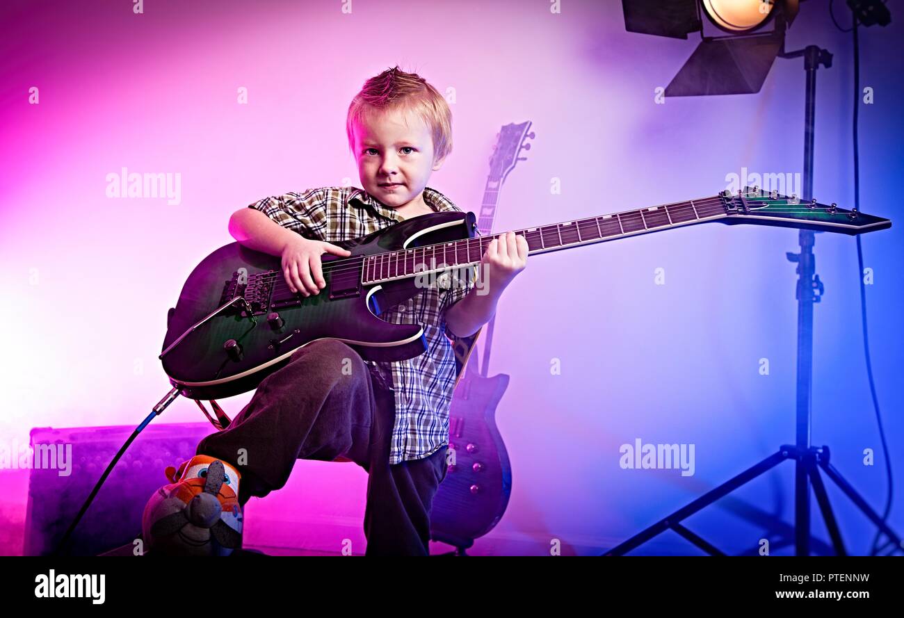 Boy playing guitar , kid guitarist Stock Photo Alamy