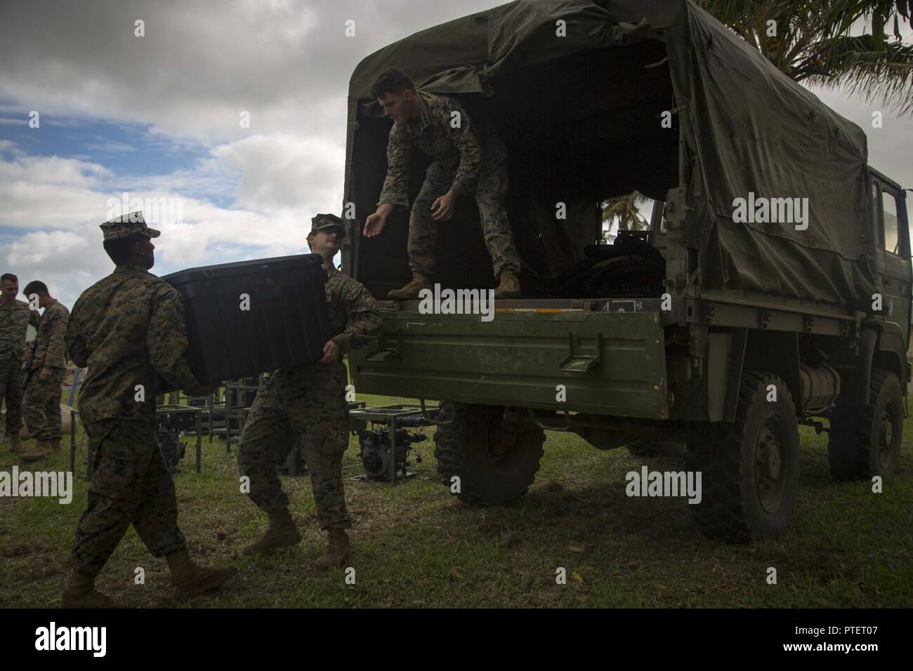 U.S. Marines with Task Force Koa Moana 17 load parts of a Light Weight Water Purification System onto a supply truck during Exercise TAFAKULA on Tongatapu Island, Tonga, July 17, 2017. Exercise TAFAKULA is designed to strengthen the military-to-military relations, infantry and combat training between Tonga’s His Majesty’s Armed Forces, French Army of New Caledonia, New Zealand Defense Force, and the United States Armed Forces. Stock Photo