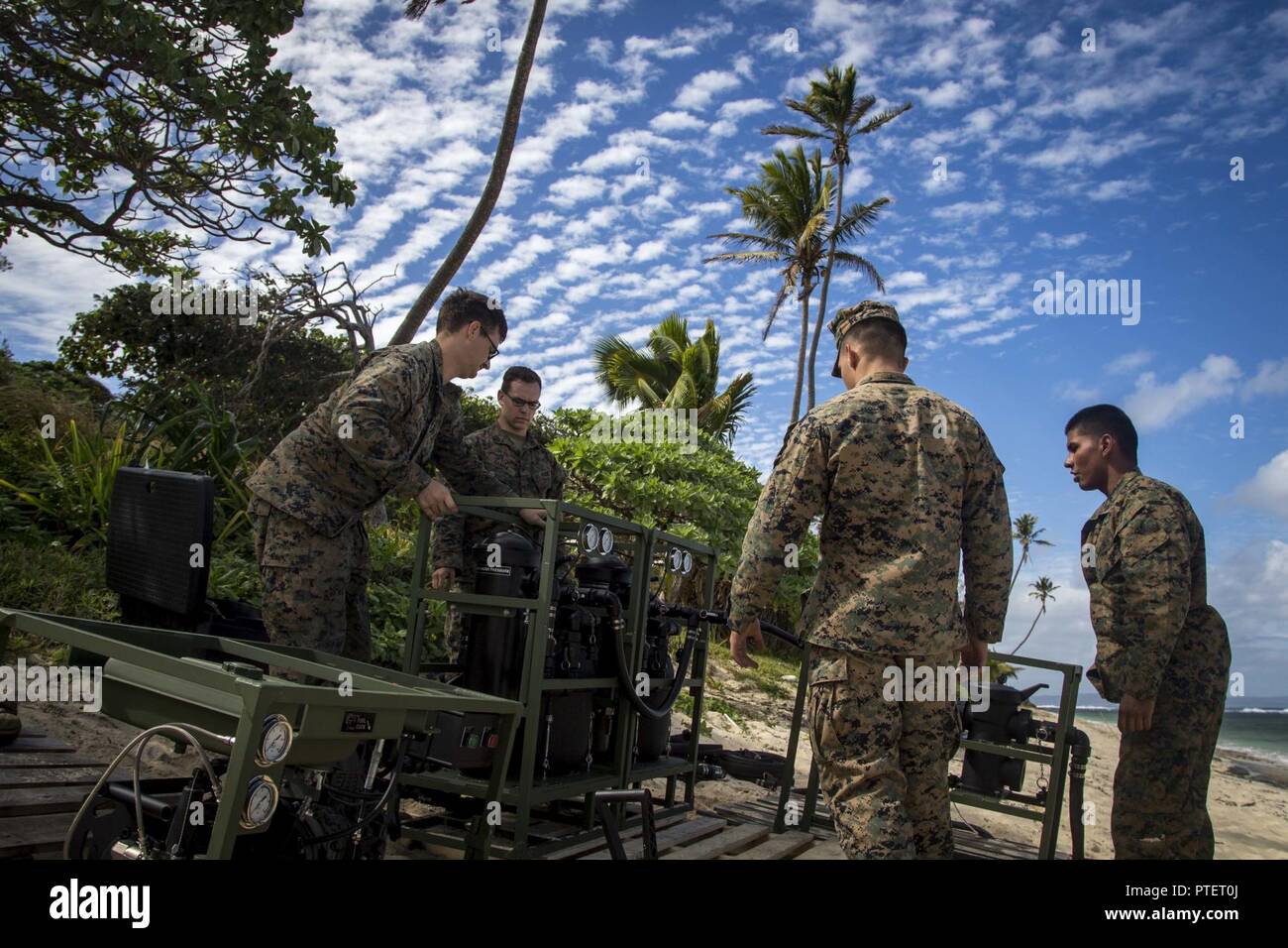 U.S. Marines with Task Force Koa Moana 17 set up a Light Weight Water Purification System on a beach on Tongatapu Island, Tonga during Exercise TAFAKULA July 17, 2017. Exercise TAFAKULA is designed to strengthen the military-to-military relations, infantry and combat training between Tonga’s His Majesty’s Armed Forces, French Army of New Caledonia, New Zealand Defense Force, and the United States Armed Forces. Stock Photo