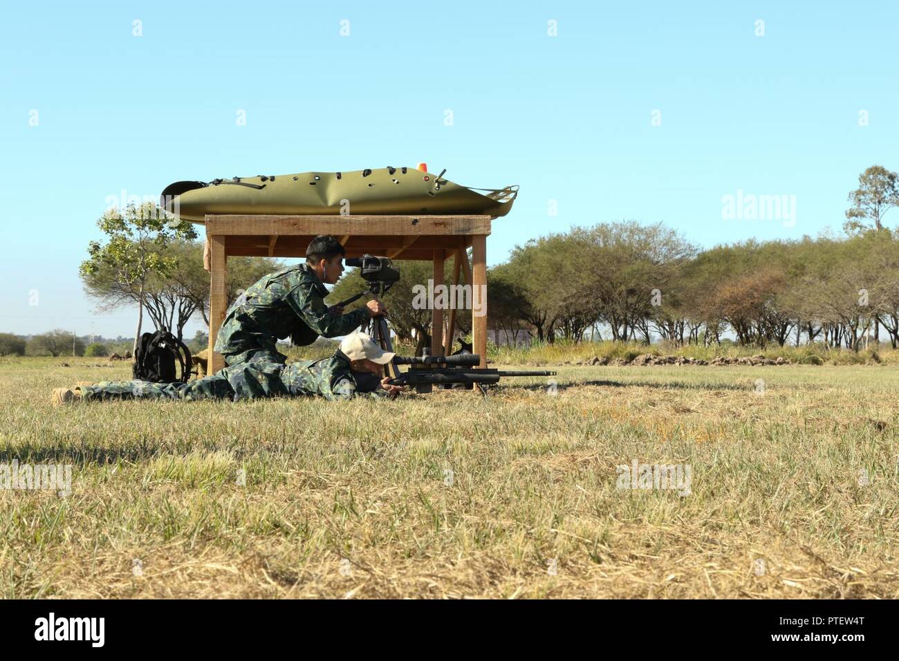 Team Paraguay's sniper duo prepare for their first shot during a long ...