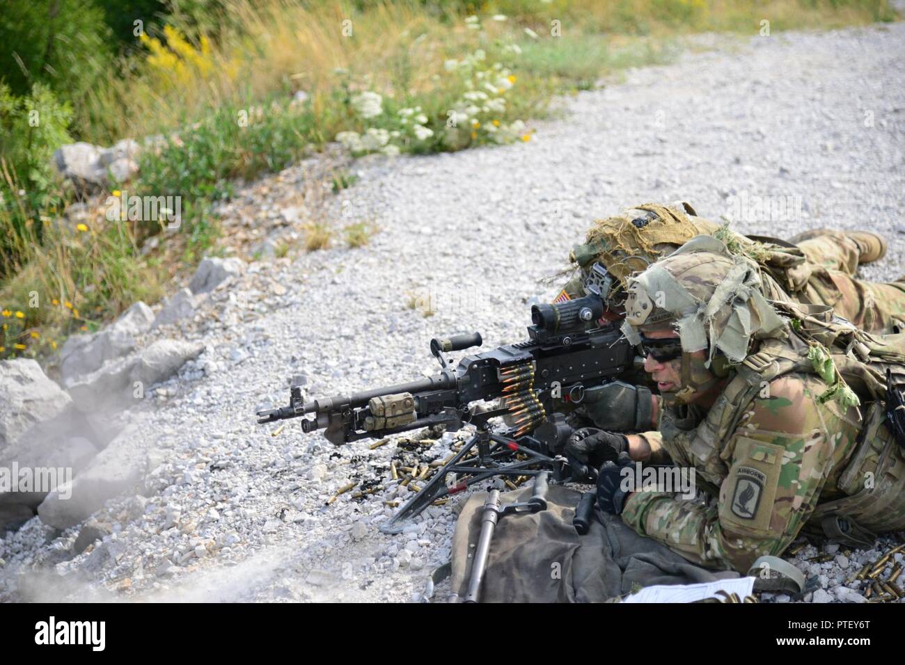 A U.S. Army Paratrooper assigned to 2nd Battalion, 503rd Infantry Regiment, 173rd Airborne Brigade, engages target during a live-fire exercise as part of Exercise Rock Knight at Pocek Range in Postonja, Slovenia, July 19, 2017. Exercise Rock Knight is a bilateral training exercise between the U.S. Army 173rd Airborne Brigade and the Slovenian Armed Forces, focused on small-unit tactics and building on previous lessons learned, forging the bonds and enhancing readiness between allied forces. The 173rd Airborne Brigade is the U.S. Army's Contingency Response Force in Europe, providing rapidly-de Stock Photo