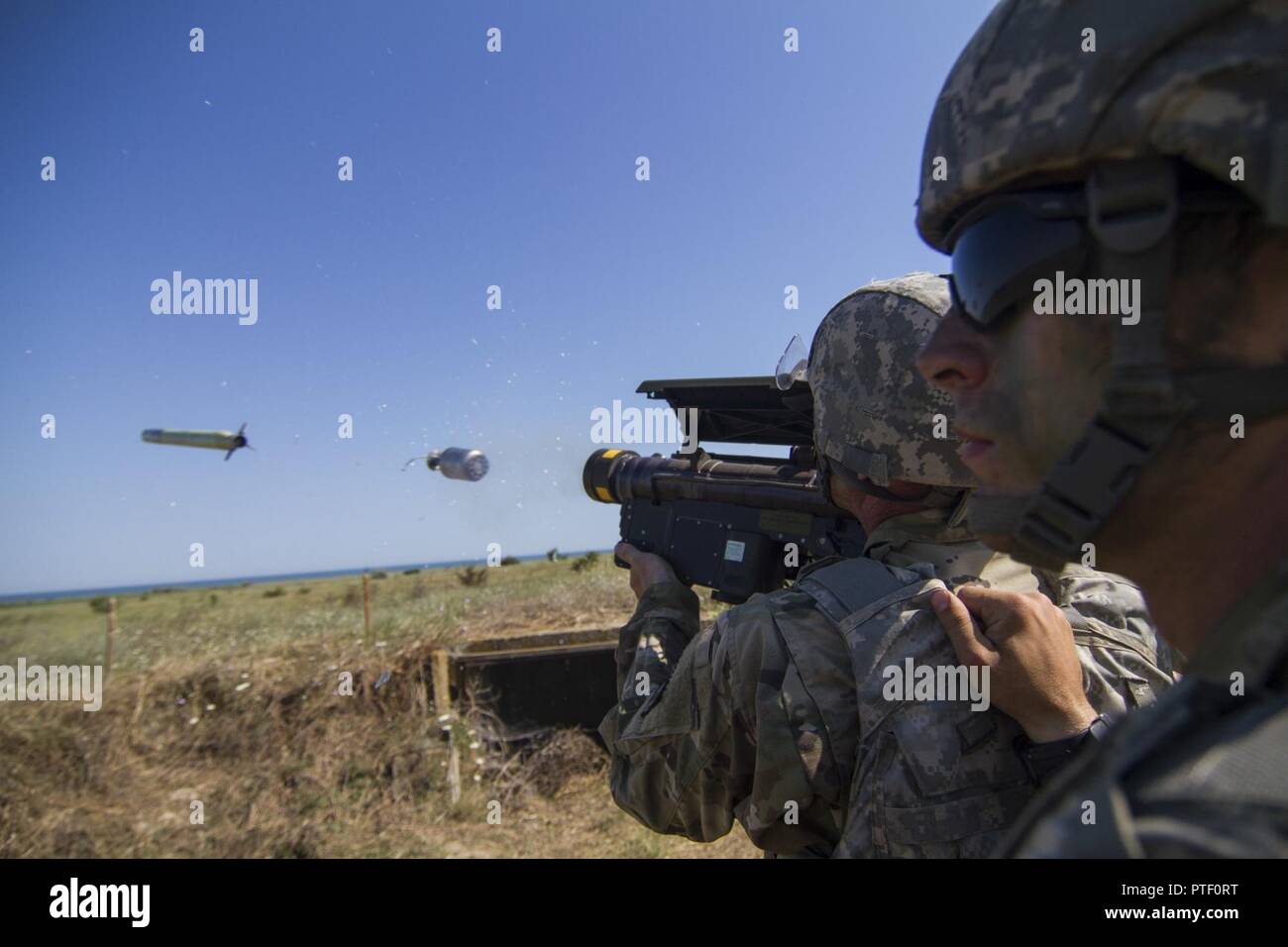Soldiers with C Battery, 2nd battalion, 263rd Army Air and Missile Defense Command, South Carolina Army National Guard, fire a FIM-92 Stinger from a Man-Portable Air-Defense System configuration during live fire training July 19, 2017, at Capu Midia, Romania, as part of Saber Guardian 17. Saber Guardian is a U.S. Army Europe-led, multinational exercise that spans across Bulgaria, Hungary and Romania with more than 25,000 service members from 22 allied and partner nations. Stock Photo