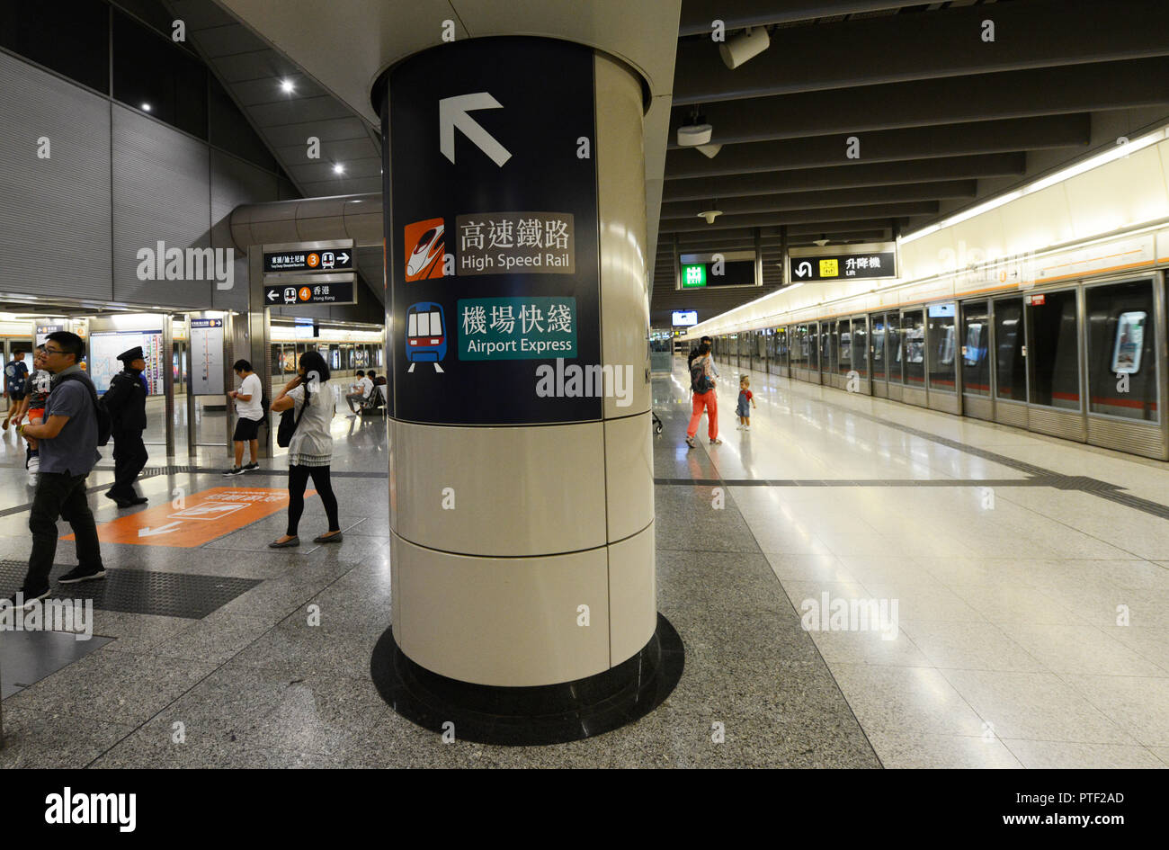 Passengers waiting for The Tung Chung line in Hong Kong station Stock