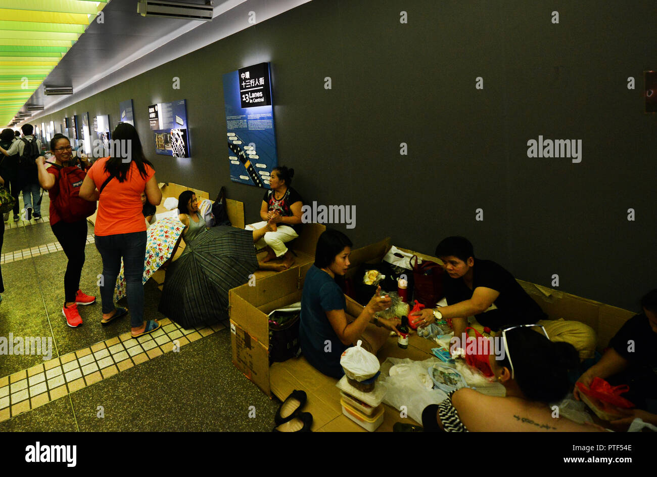 Filipino domestic helpers enjoying their Sunday ( day off ) in Hong