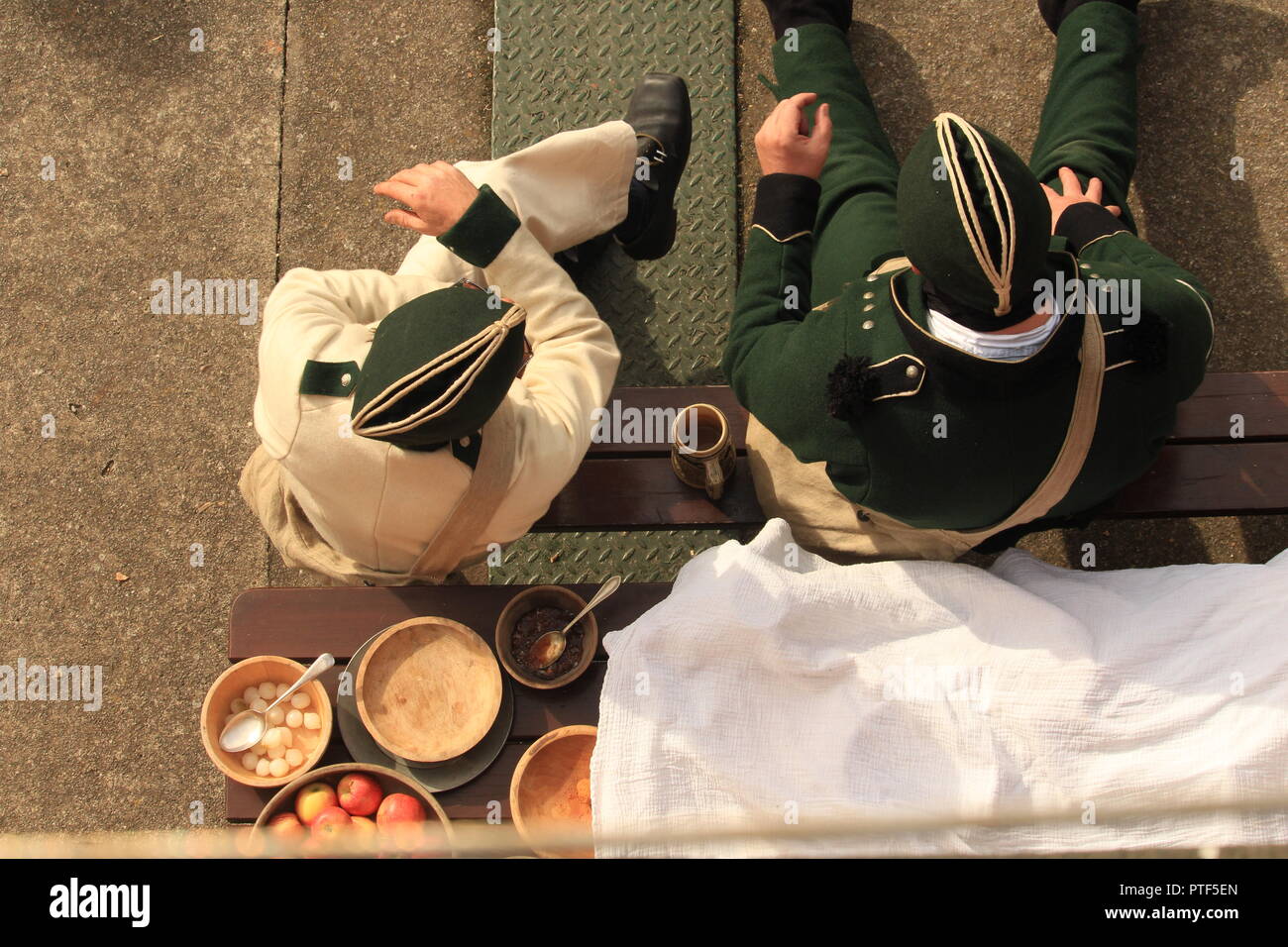 Filming overhead  POV- Rifleman Diaries- Two riflemen seated in period military costume. Stock Photo