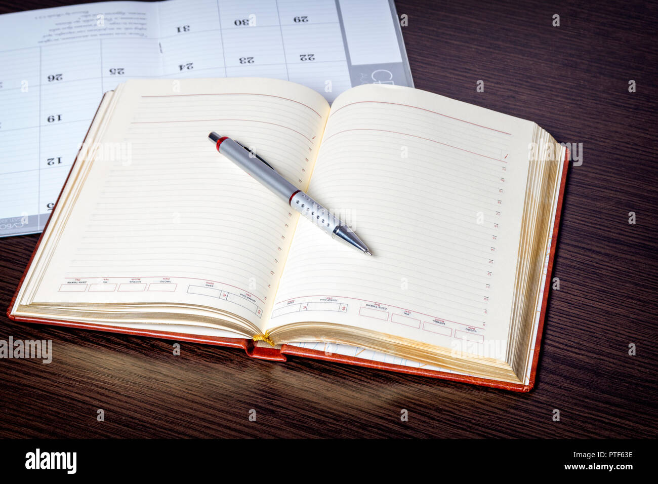 Blank notebook on wood background Stock Photo