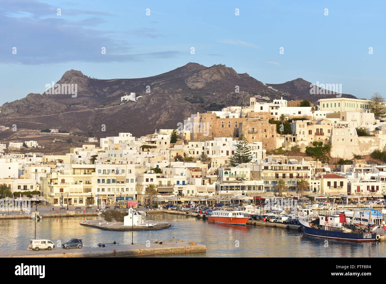 Greece, the beautiful island of Naxos. The ferry comes into dock in the  late afternoon giving a view of the islands capital, Naxos town Stock Photo  - Alamy