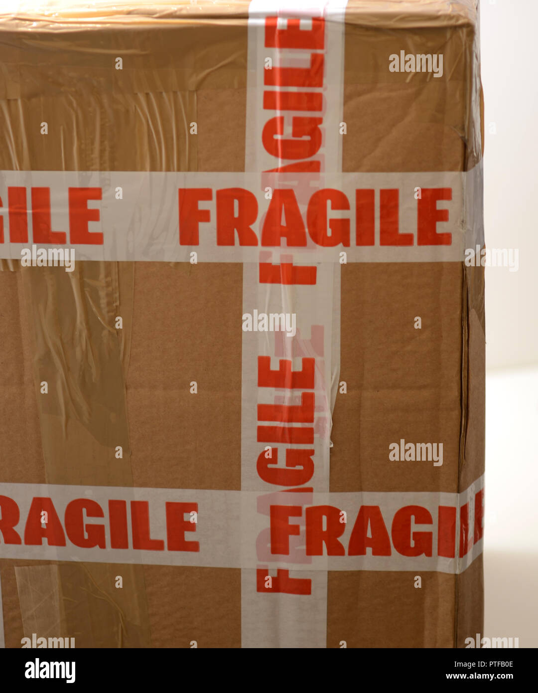 Parcel with fragile sticker Stock Photo
