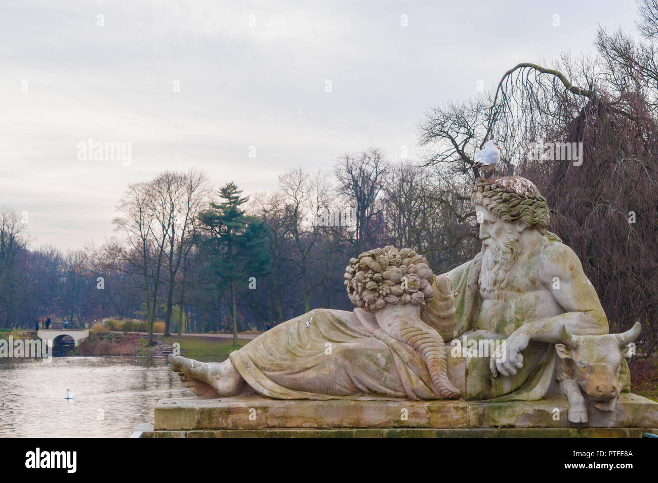 Allegory of the Bug river, statue in Lazienki Park (Royal Baths Park), Warsaw, Poland Stock Photo
