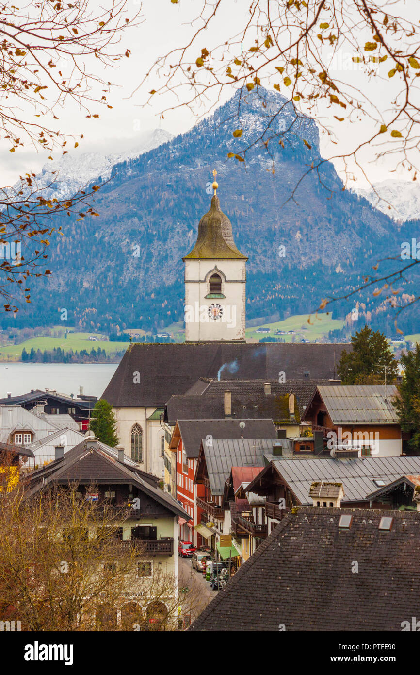 View of austrian alpine town St.Wolfgang on Wolfgangsee lake with St.Wolfgang church. Popular touristic destination. Stock Photo