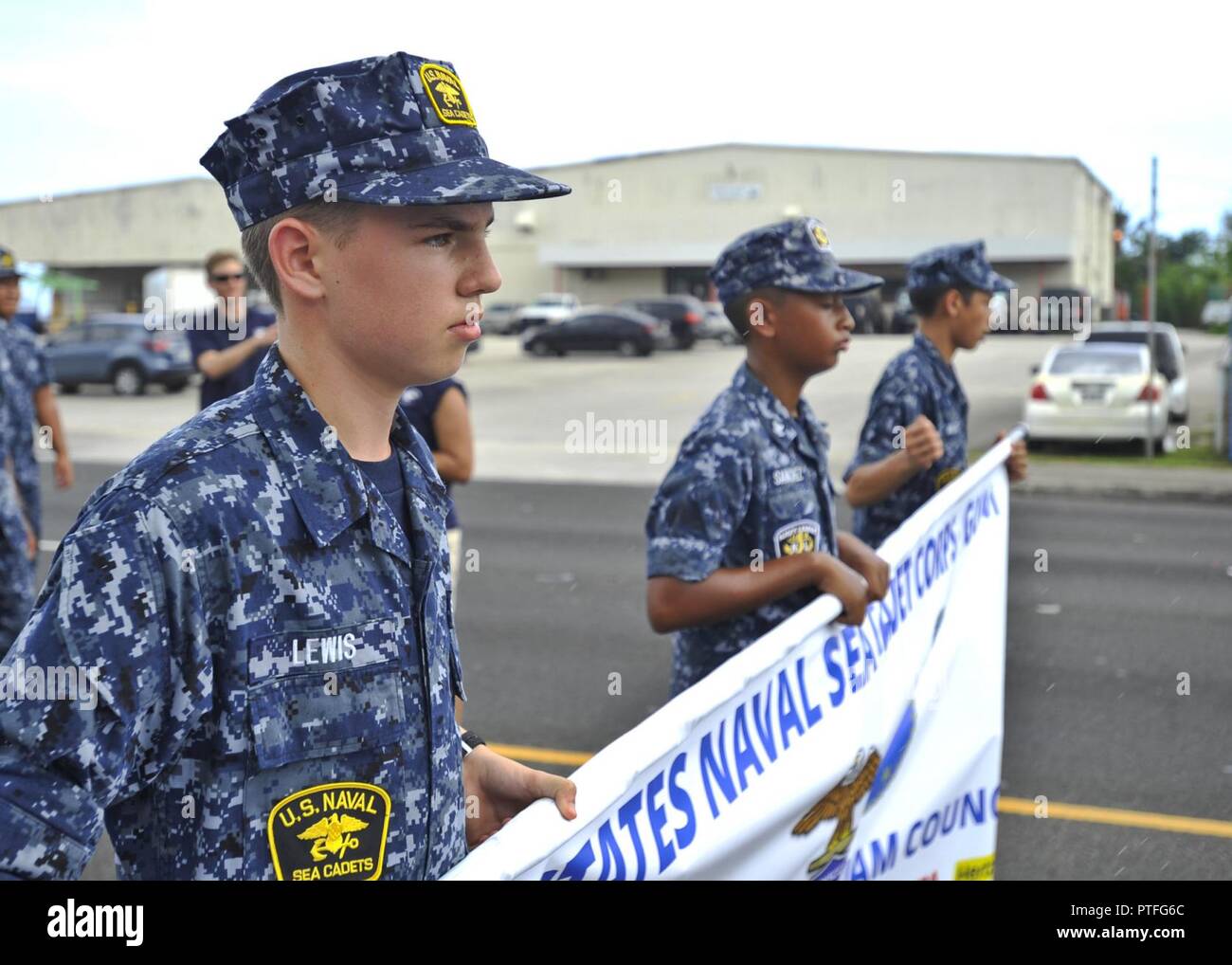Guam (July 21, 2017) Sea cadets from U.S. Naval Sea Cadet Corps Marianas Division Guam march during Guam's annual Liberation Day Parade in Hagatna, Guam, July 21. The 2017 Guam Liberation Parade celebrates the 73rd anniversary of the liberation of Guam from Japanese occupation by U.S. forces during World War II. Land, homeported in Guam, provides maintenance, hotel services and logistical support to submarines and surface ships in the U.S. 5th and 7th Fleet areas of operations. Stock Photo