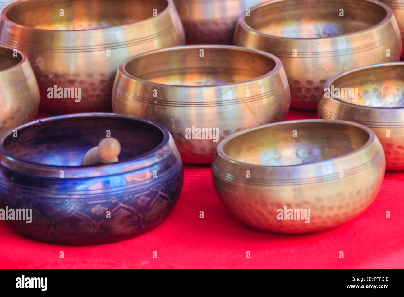 Tibetan singing bowls for sale at the antique market. Singing bowls
