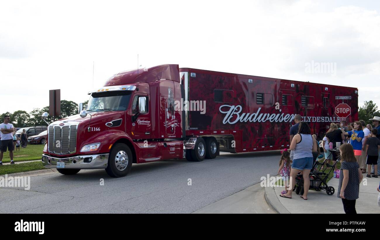 A Budweiser Clydesdales tractor trailer pulls into base housing July 16,  2017, on Dover Air Force Base, Del. It required three tractor trailers to  transport the team of eight horses and wagon, image size:1300x821