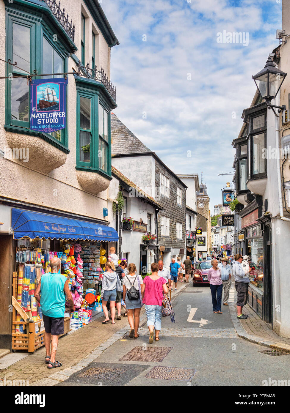 6 June 2018: Looe, Cornwall, UK - Shopping in Fore Street on a warm spring day. Stock Photo