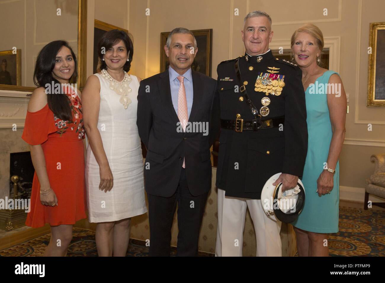From left, Nikisha Mirpuri, Gouri Mirpuri, His Excellency Ashok Kumar