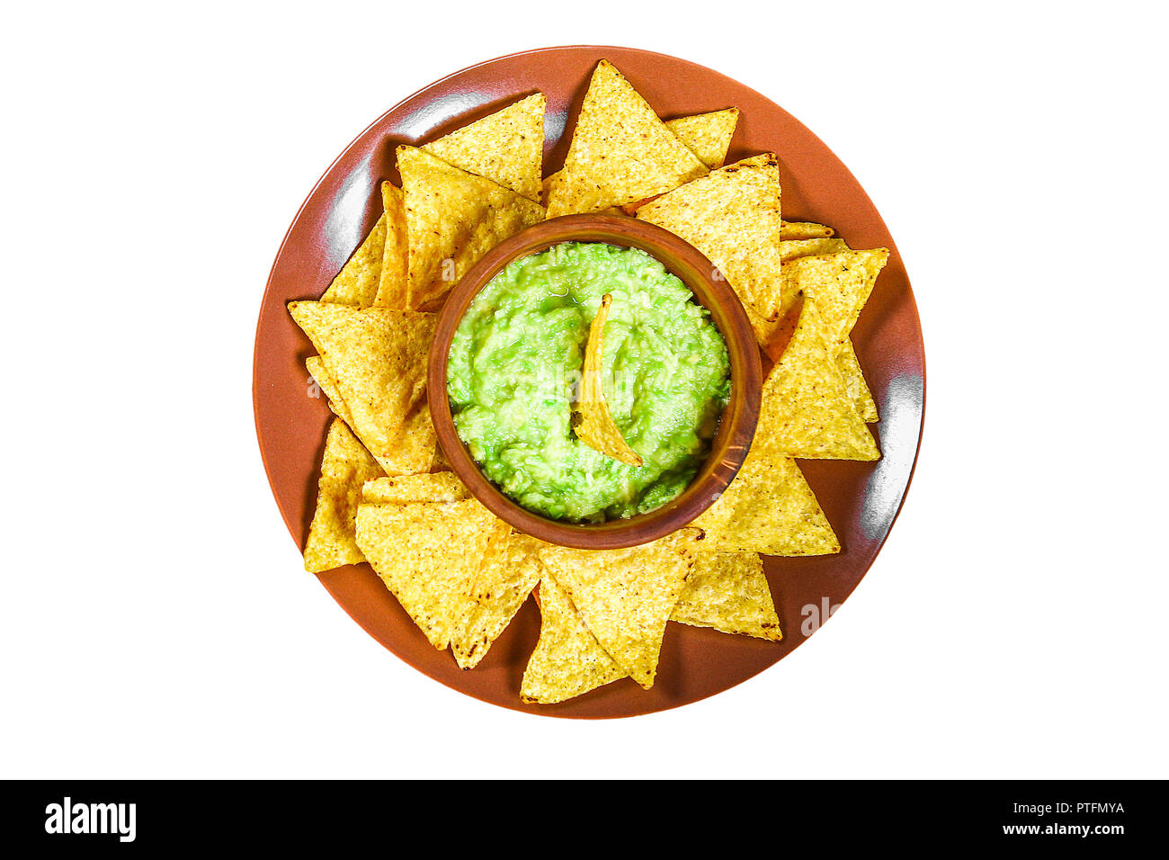 Traditional Mexican Guacamole sauce made from avocado and lime chips