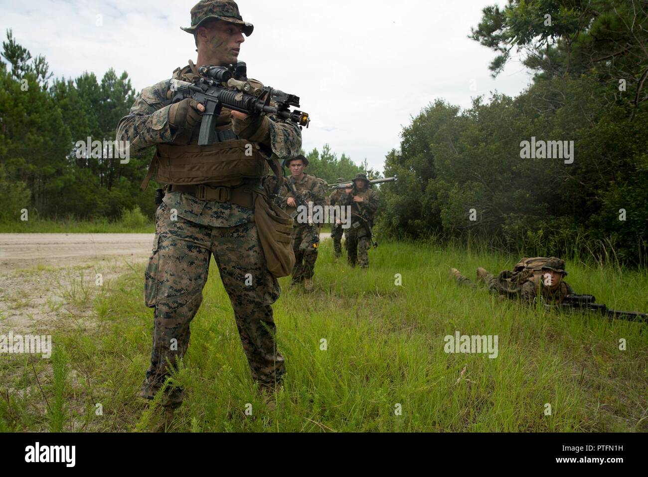 U.S. Marine Cpl. Jared B. Varcoe, left, a squad leader with Battalion ...