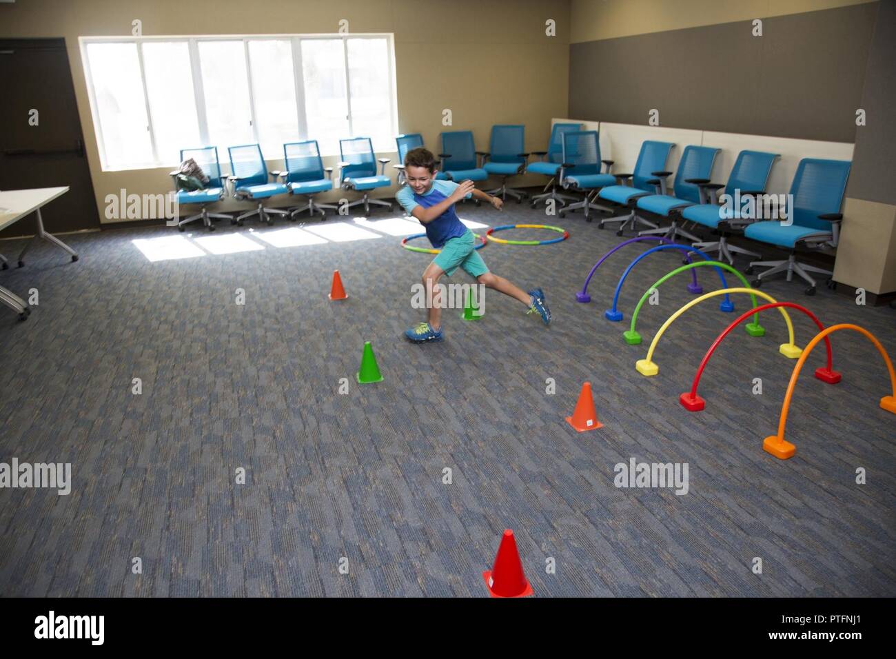 Nine Year Old Blake Stevens Runs The Obstacle Course At Mctureous Hall On Marine Corps Logistics Base Barstow Calif As Part Of The End Of Summer Reading Program Ice Cream Party Fun Staged By Marine corps body composition program and military appearance program. alamy