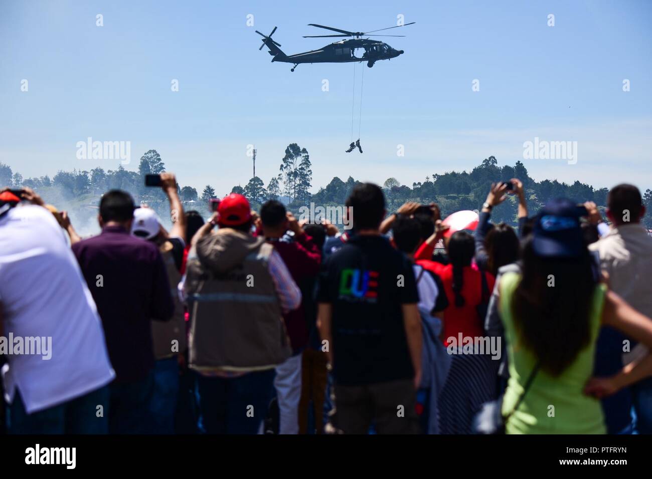 A Colombian UH-60 Black Hawk helicopter participates in Feria Aeronautica Internacional—Colombia 2017 at José María Córdova International Airport in Rionegro, Colombia, July 13, 2017. The United States Air Force is participating in the four-day air show with two South Carolina Air National Guard F-16s as static displays, plus static displays of a KC-135, KC-10, along with an F-16 aerial demonstration by the Air Combat Command’s Viper East Demo Team. United States military participation in the air show provides an opportunity to strengthen our military-to-military relationships with regional pa Stock Photo