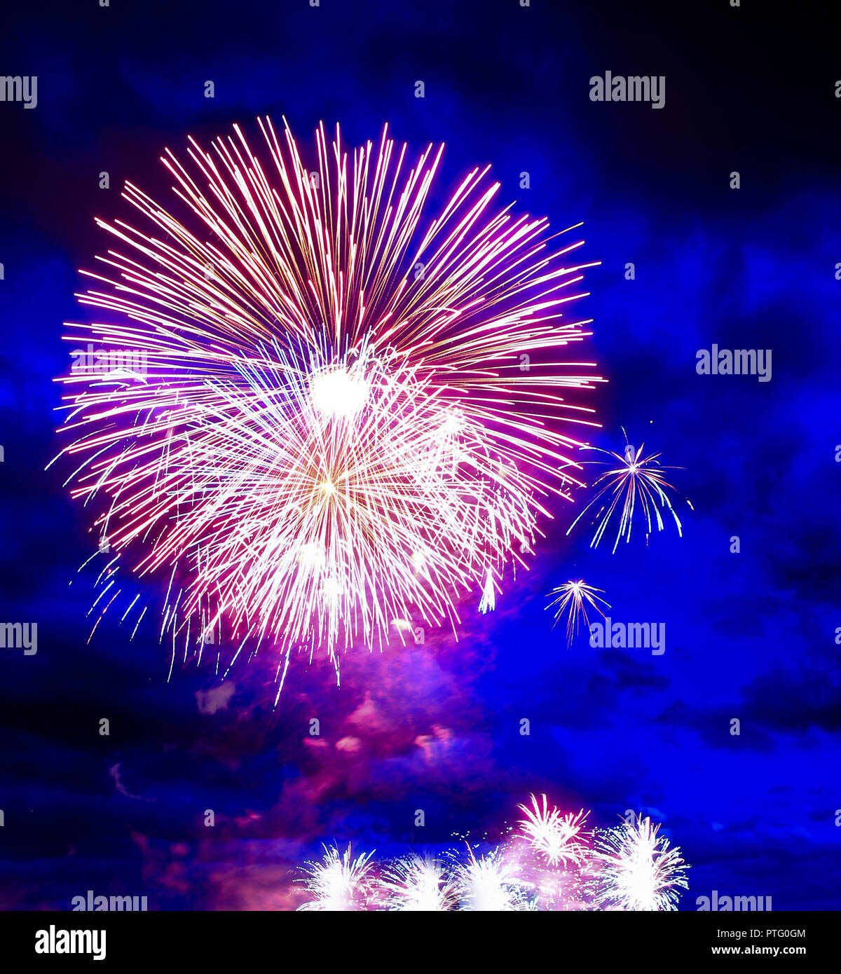 celebratory salute against the night sky Stock Photo