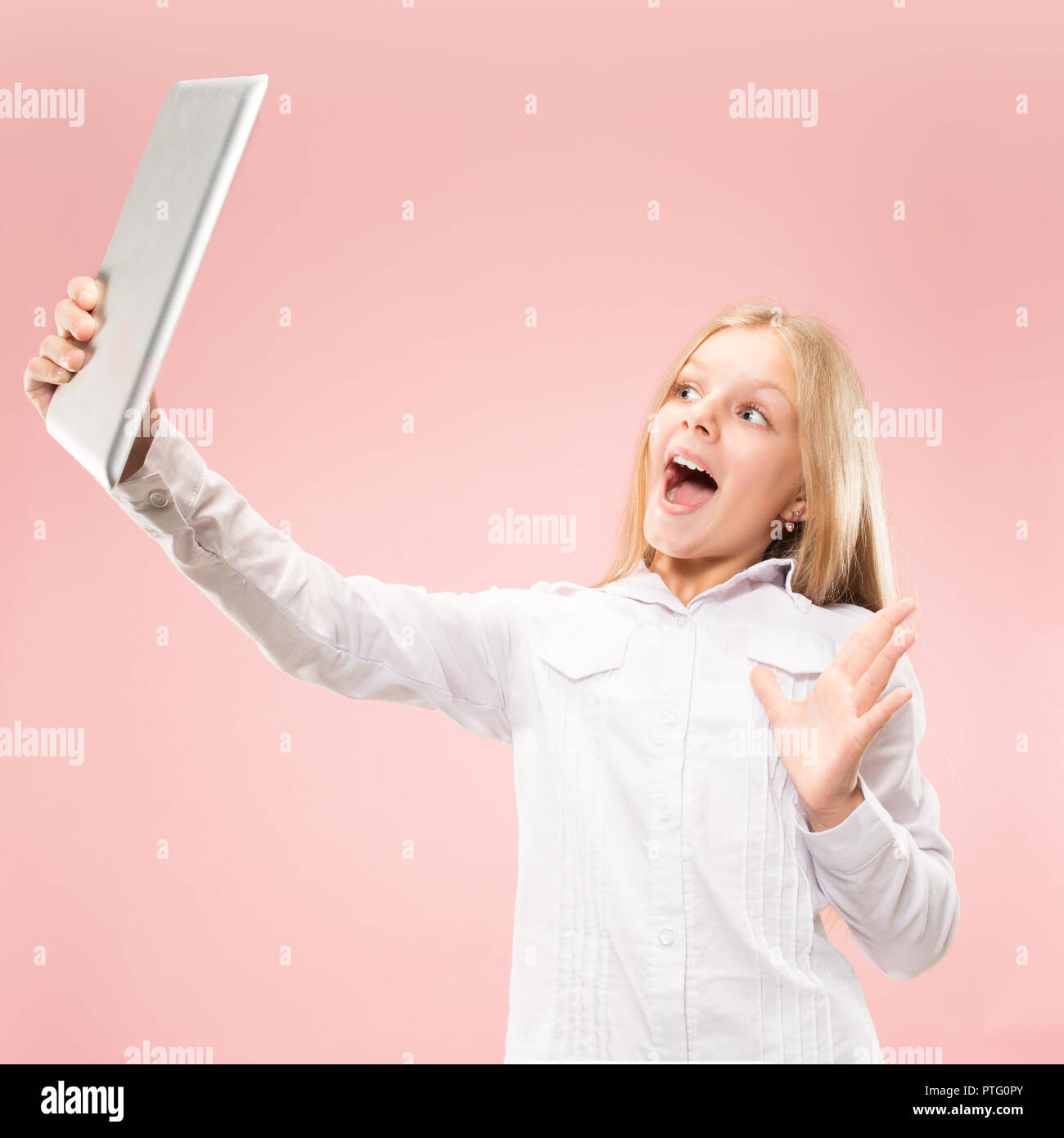 Teen girl with laptop. Love to computer concept. Attractive female half ...