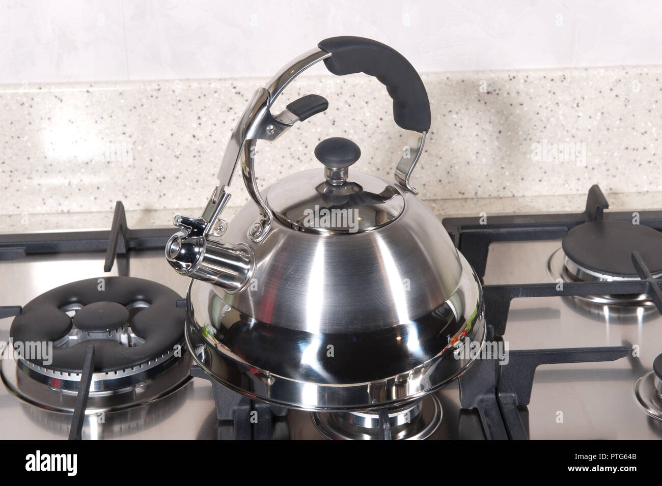 https://c8.alamy.com/comp/PTG64B/metal-kettle-on-the-stove-PTG64B.jpg