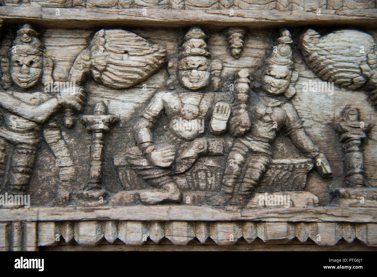Antique Indian temple door carving detail Stock Photo