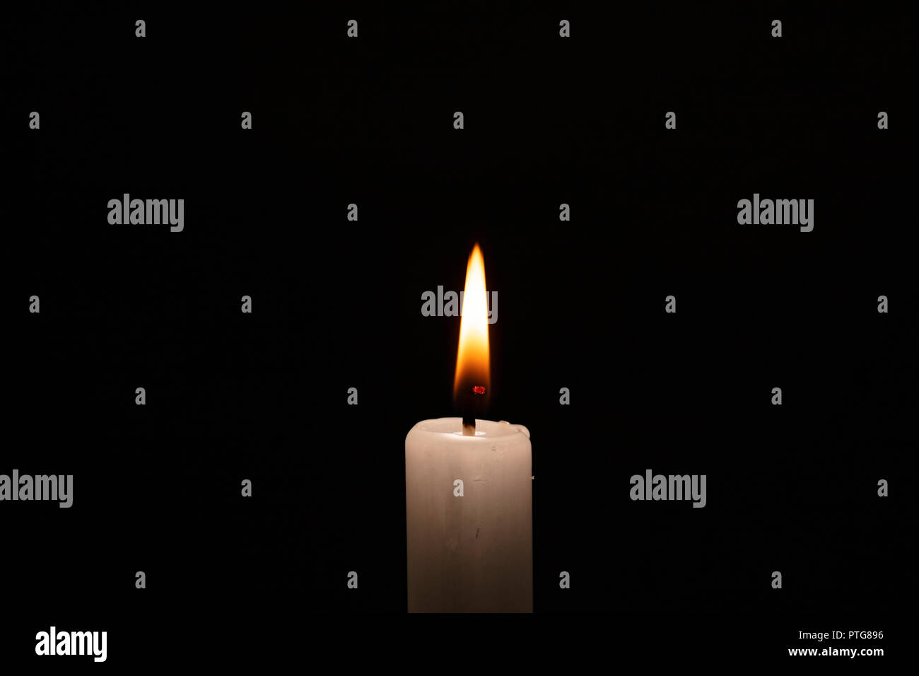 White Candle with flame, weiße Kerze Stock Photo