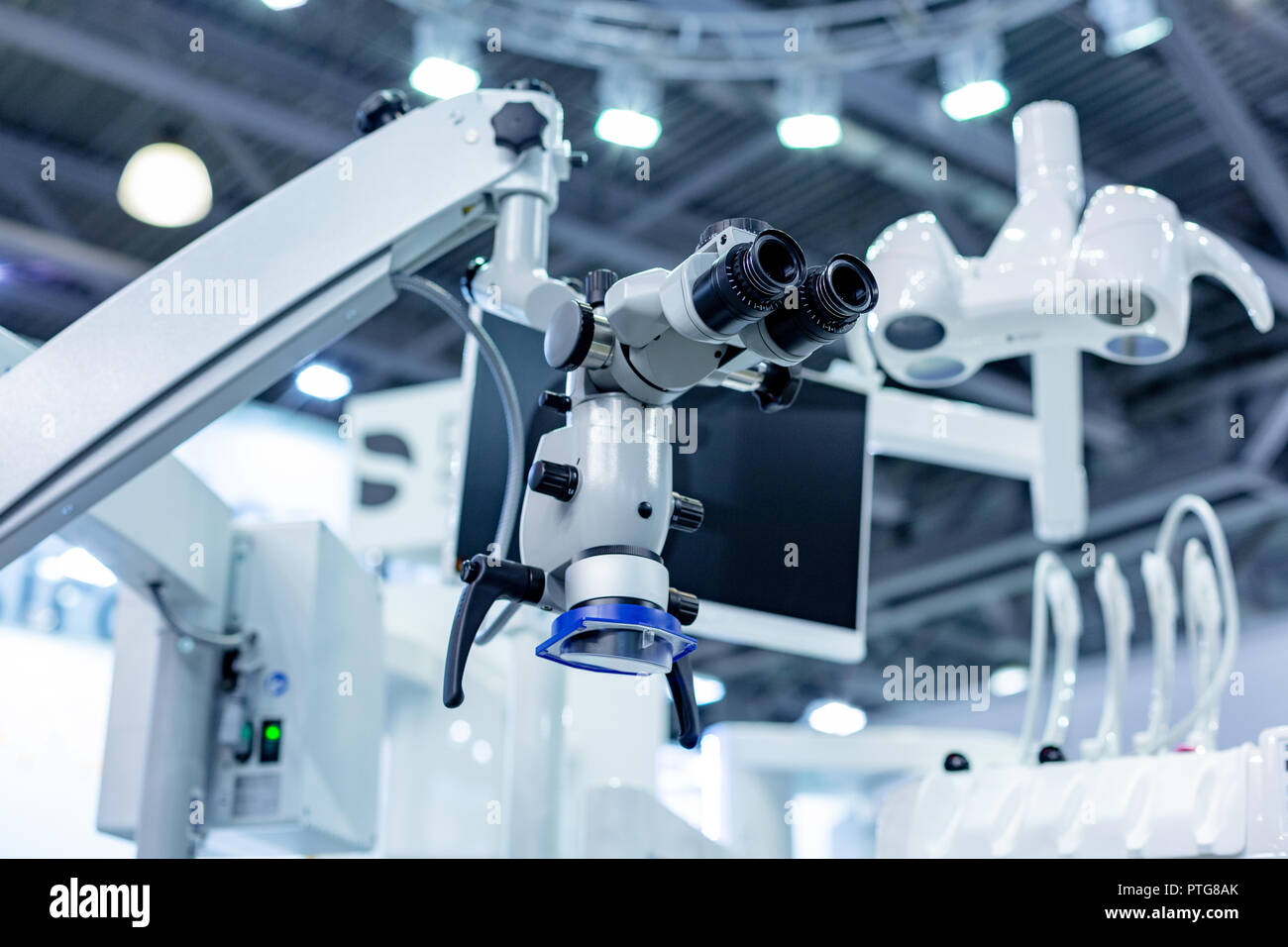 Dental microscope on the background of modern dentistry. Medical