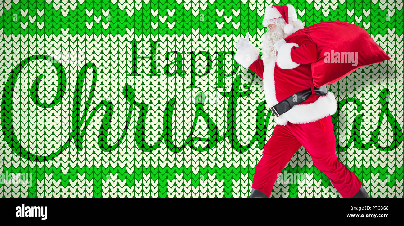 Composite image of positive santa with a sack and thumbs up Stock Photo ...