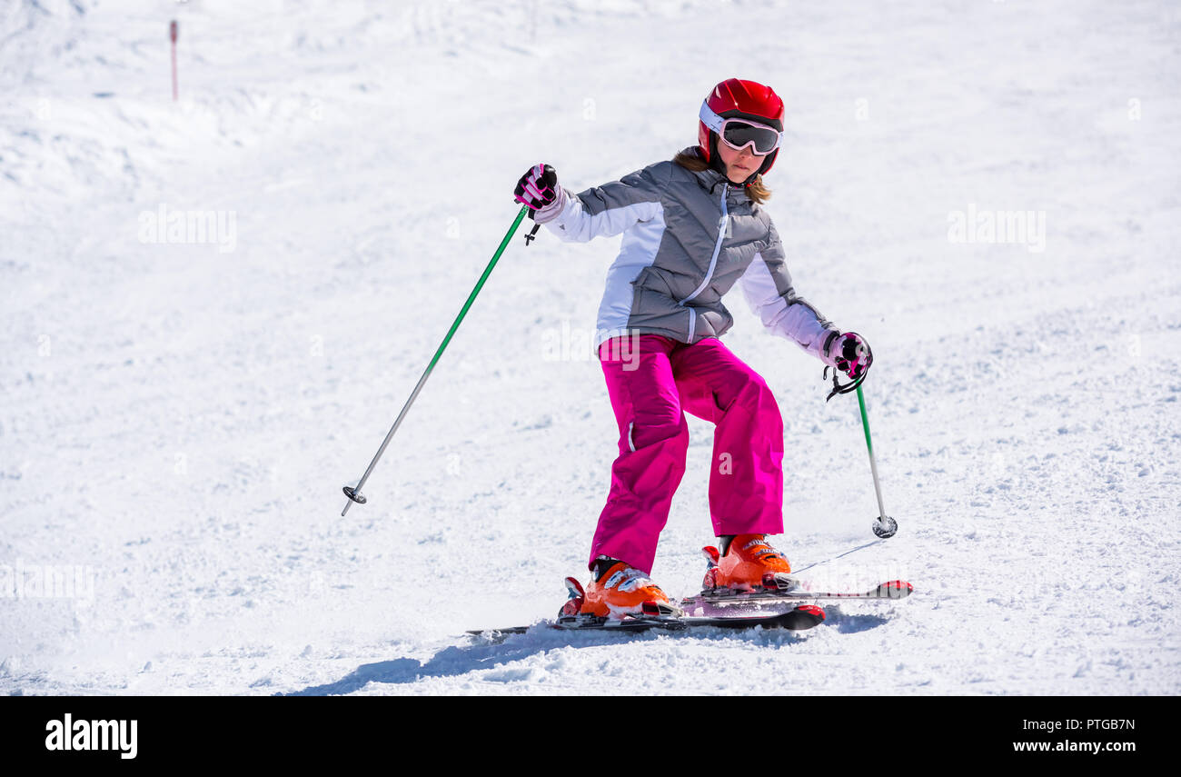 Happy little girl on the ski slope Stock Photo Alamy