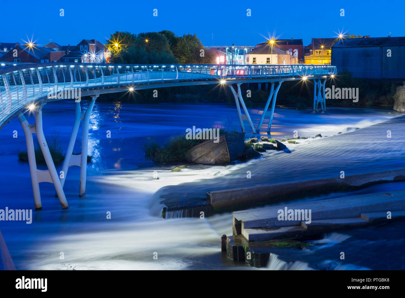 Footbridge over River Aire, at night, Castleford, West Yorkshire, England, September Stock Photo
