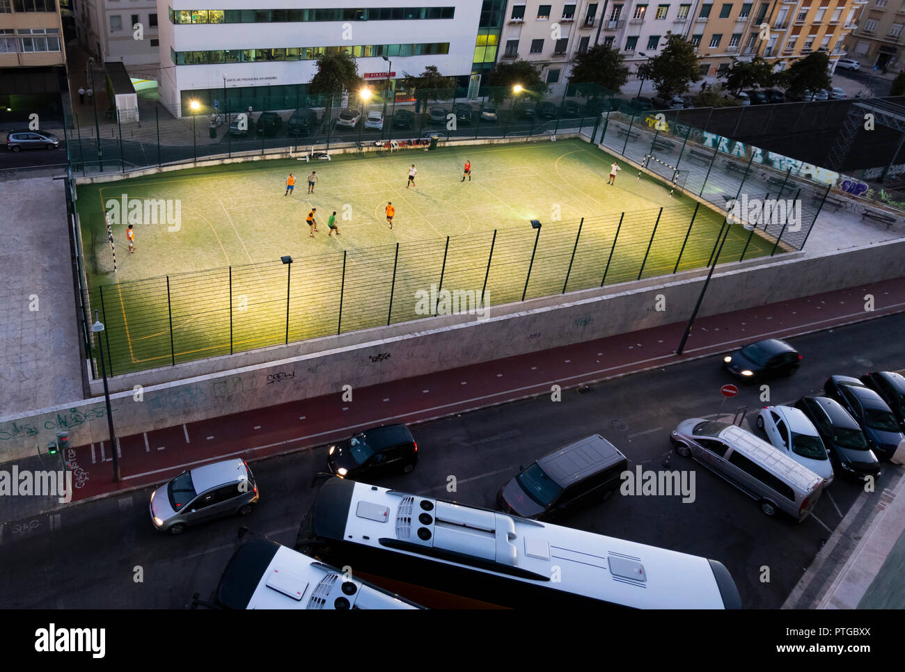 Overview of an amateur soccer game at night in Lisbon, Portugal (football Stock Photo Alamy