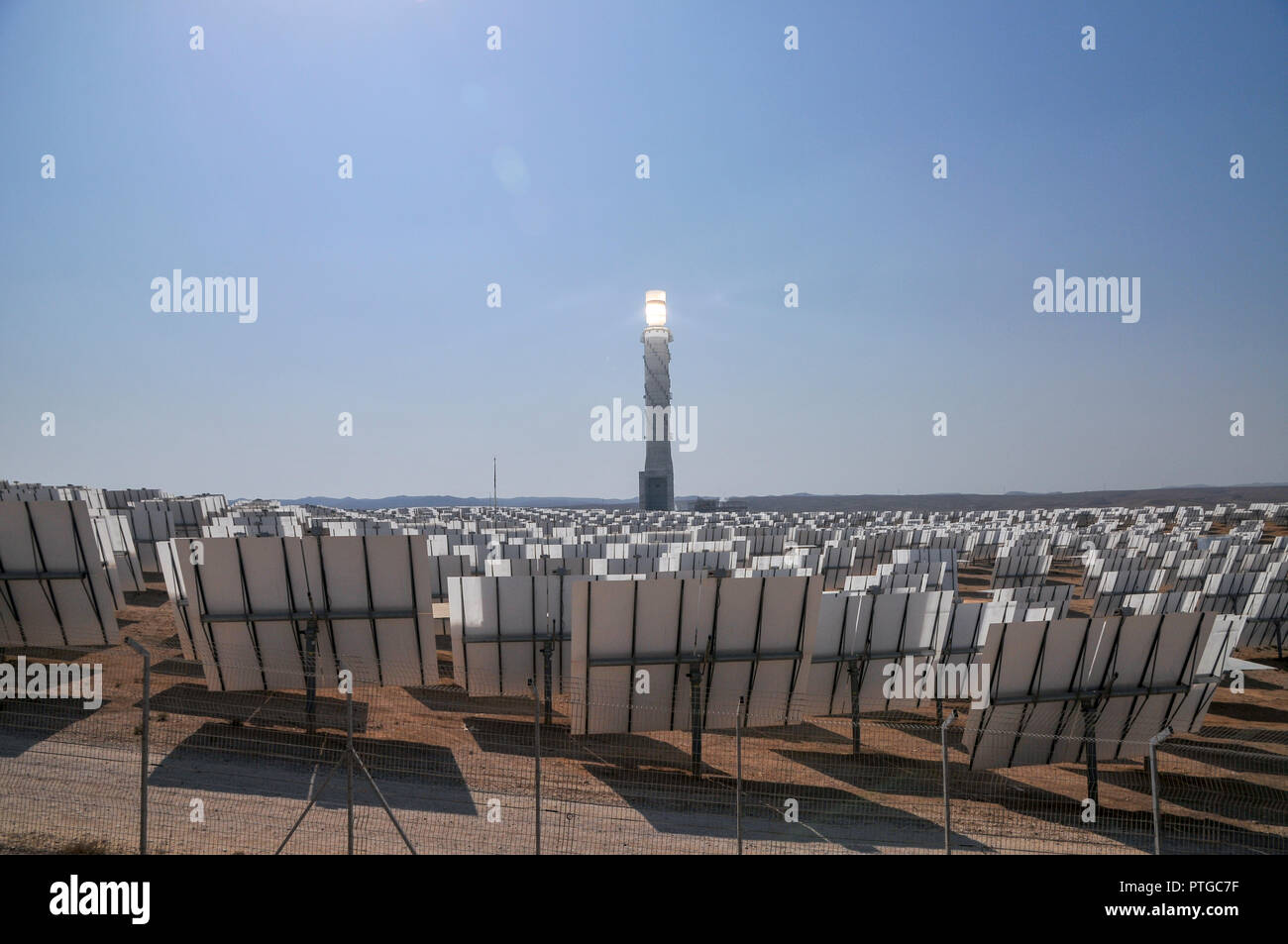 The Ashalim Solar Power station is a solar thermal power station in the Negev desert near the kibbutz of Ashalim, in Israel. The station will provide  Stock Photo