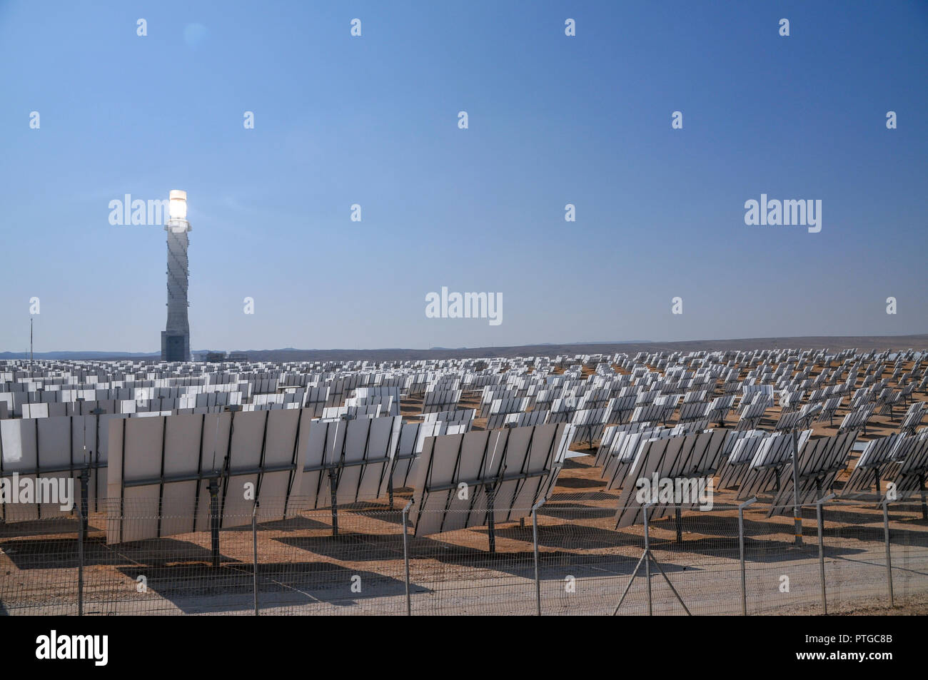 The Ashalim Solar Power station is a solar thermal power station in the Negev desert near the kibbutz of Ashalim, in Israel. The station will provide  Stock Photo