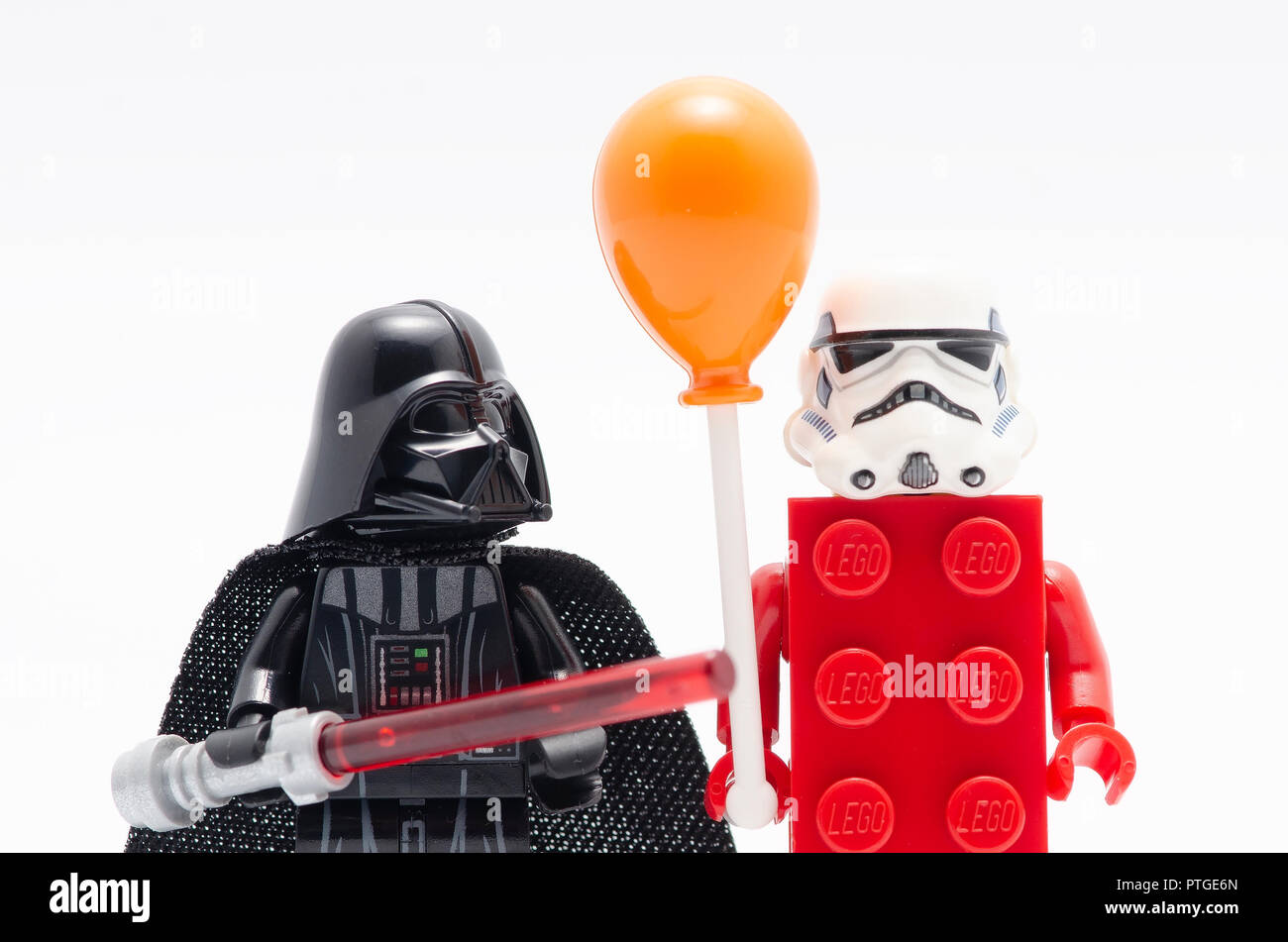 Lego darth vader and storm trooper holding balloon Stock Photo - Alamy