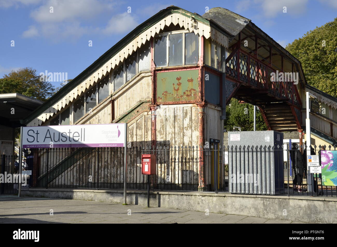 A rusted railway bridge at St. Austell station in Cornwall Stock Photo