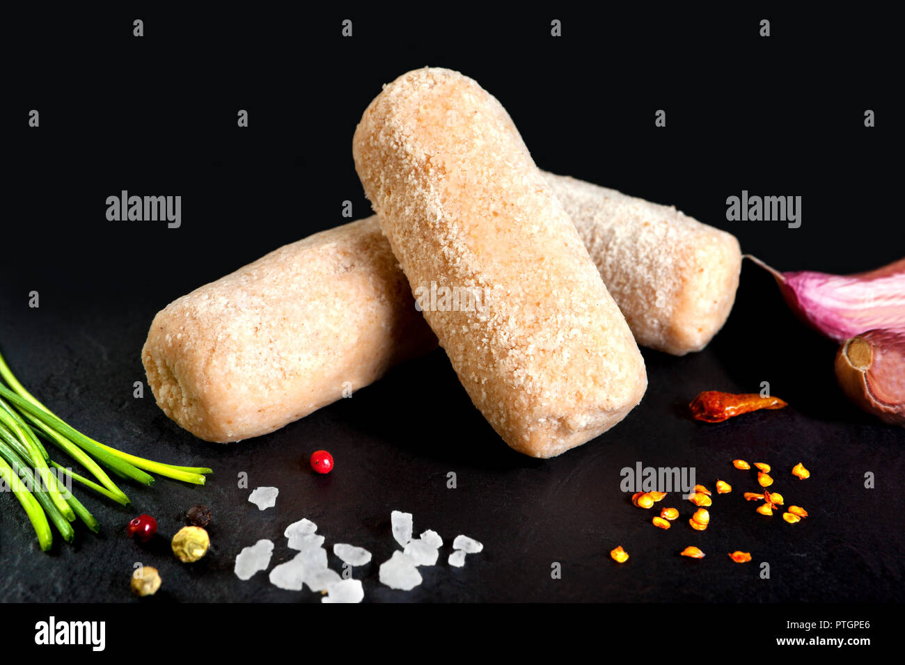 Prepared and raw food. Delicious bechamel and ham croquettes ready to